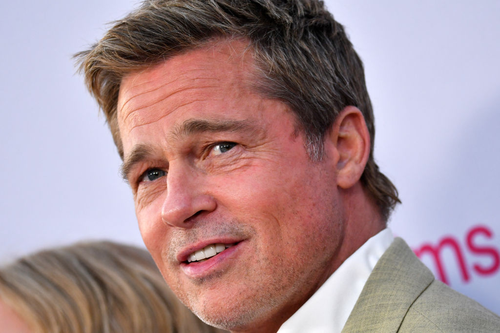 A close up picture of Brad Pitt at a red carpet event