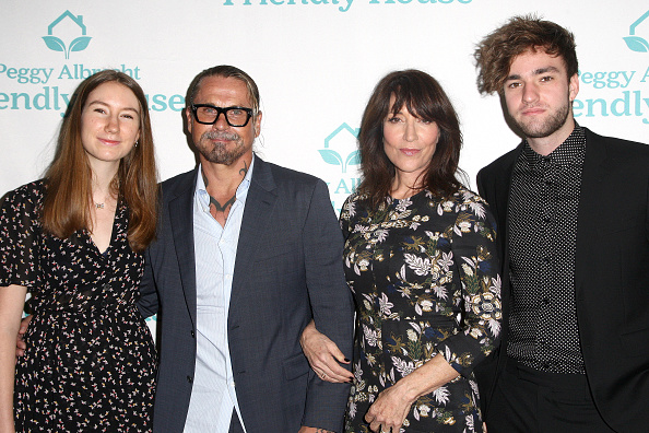 Sarah Grace White, Kurt Sutter, Katey Sagal and Jackson James White pose side by side at the Peggy Albrecht Friendly House's 27th Annual Awards Luncheon at The Beverly Hilton Hotel 