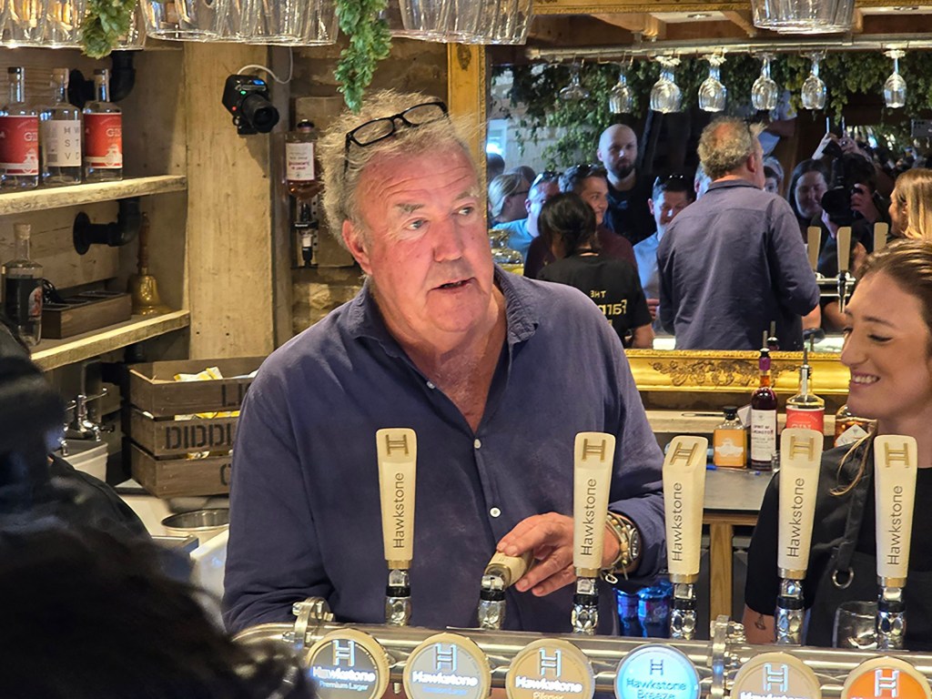 Jeremy Clarkson pouring a pint in his pub The Farmer's Dog, in Asthall, near Burford in Oxfordshire