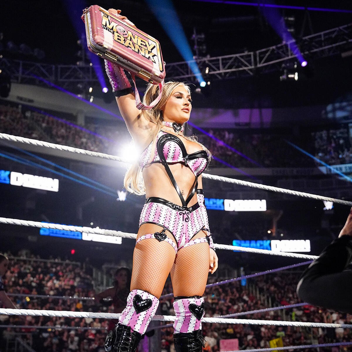 WWE superstar Tiffany Stratton poses with Money In The Bank briefcase on SmackDown