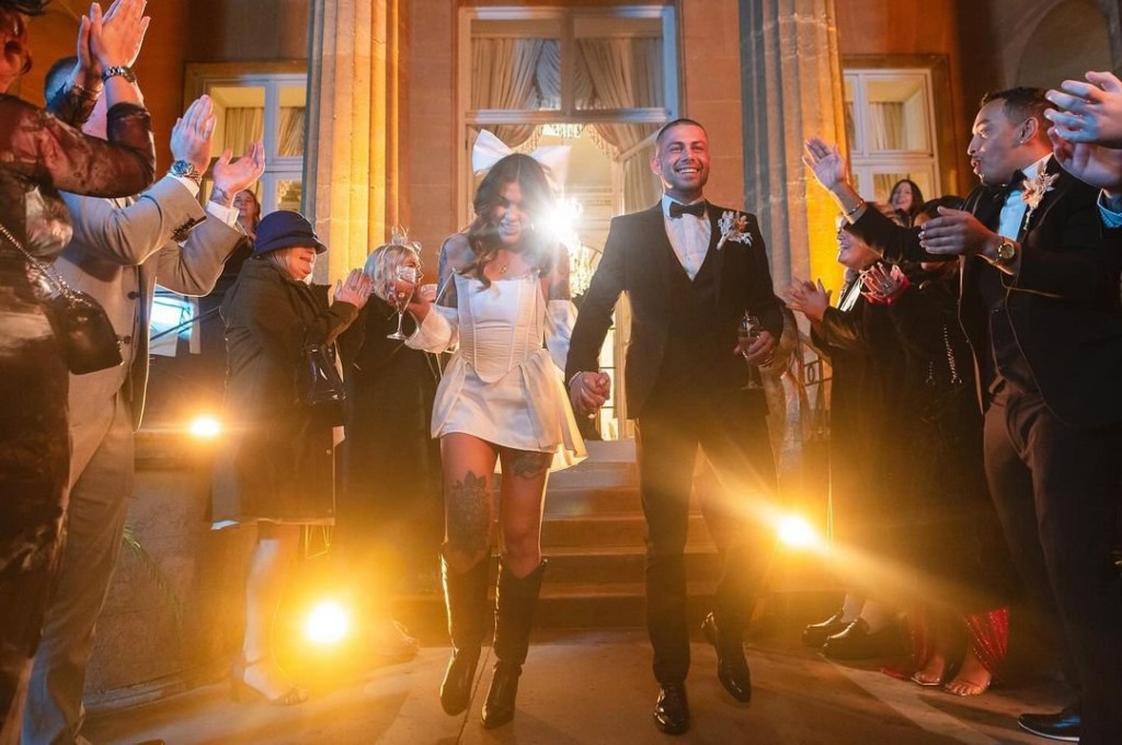 Sionainn and Ryan walking out of their weddin as family and friends clap on Married at First Sight UK 